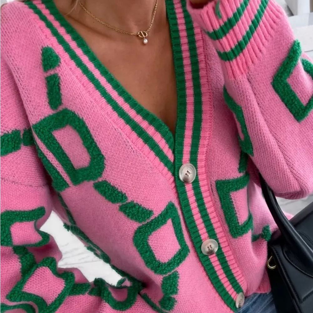 Pink and green stylish sweater. Sold out online. Brand new $58